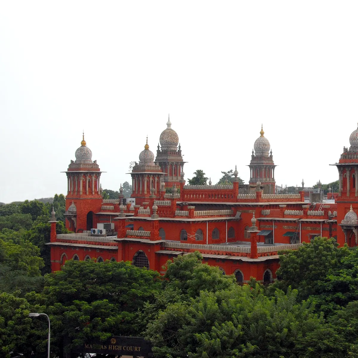Red domes and towers of the Madras High Court in Chennai