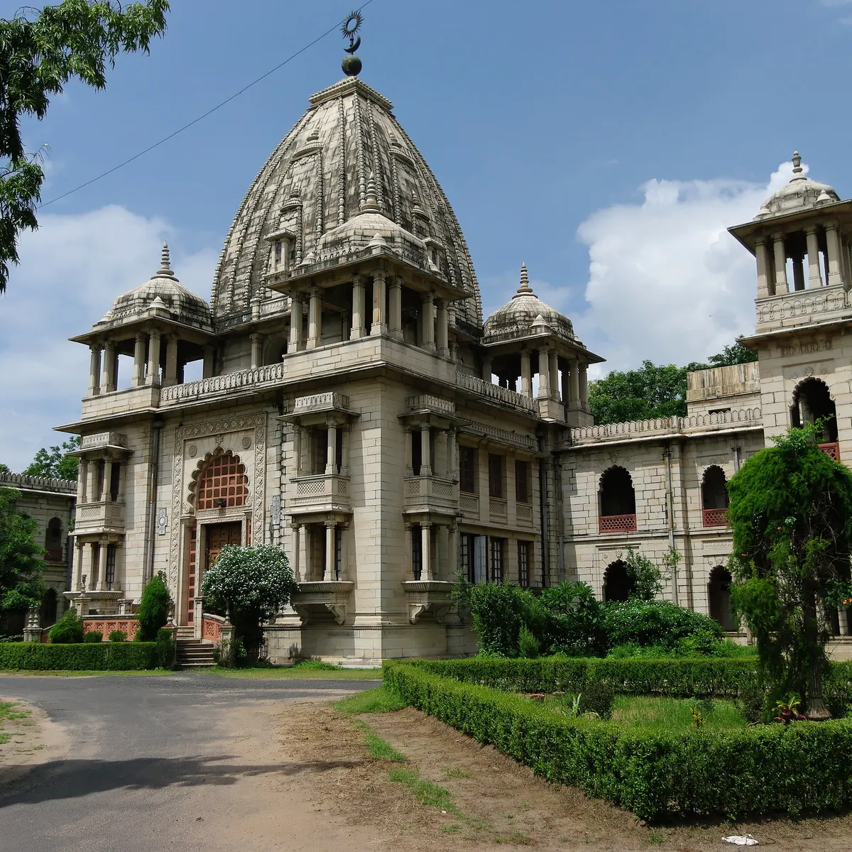 Stone facade and central tower of Kirti Mandir in Vadodara