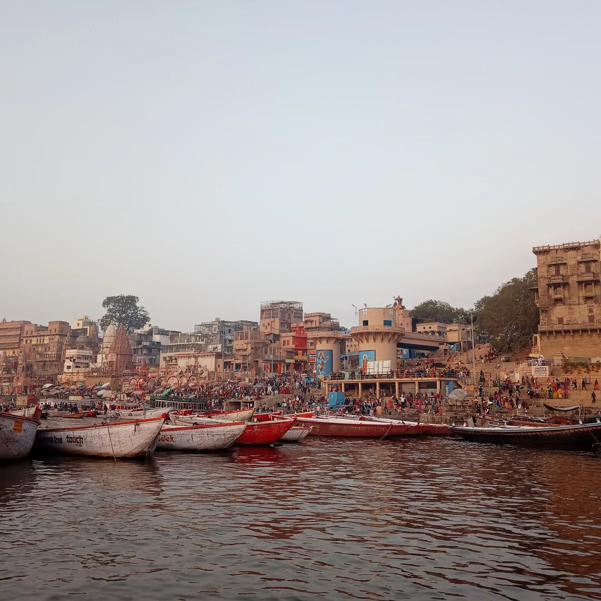 Boats and riverside buildings at Dashashwamedh Ghat in Varanasi